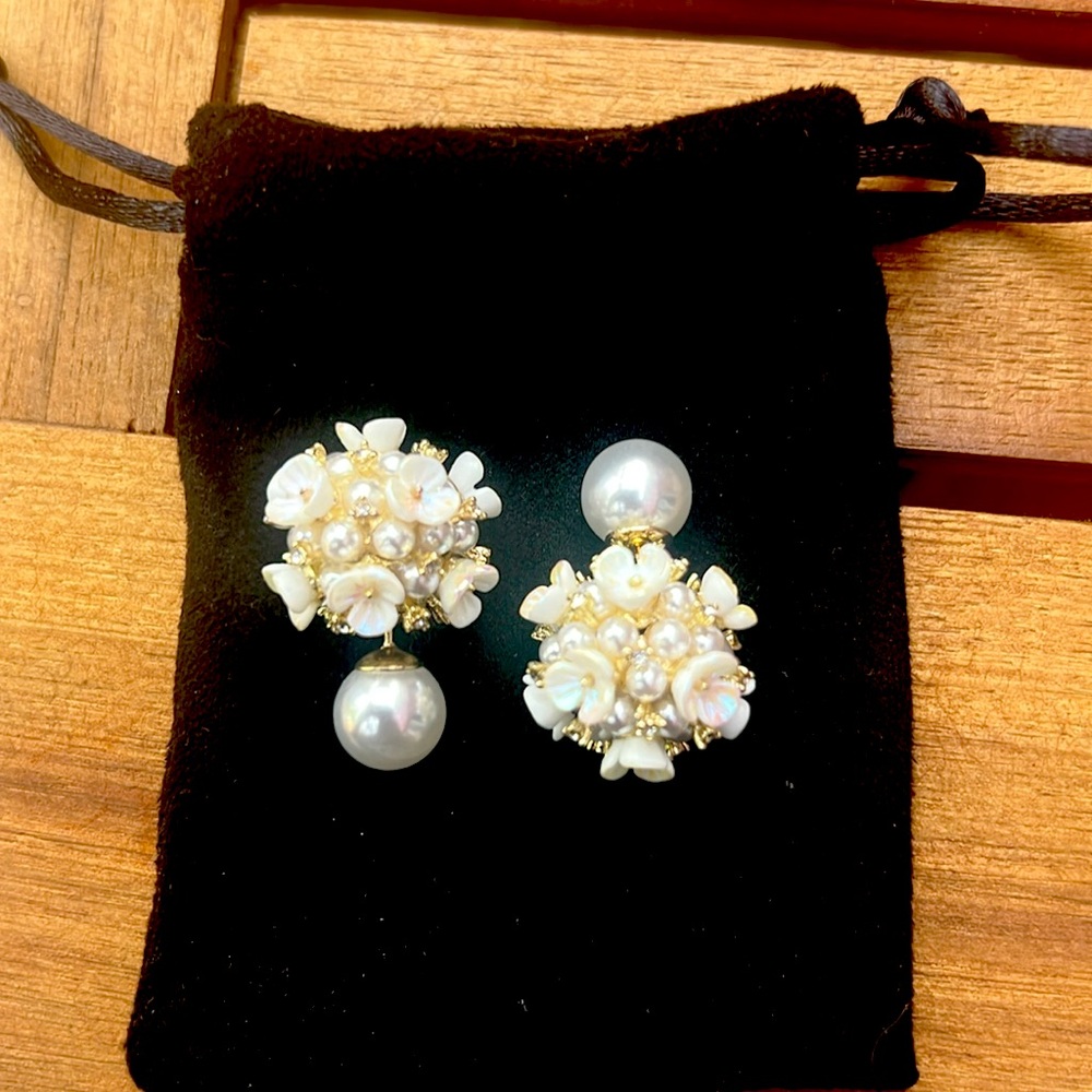 Pearl with zircon diamonds
